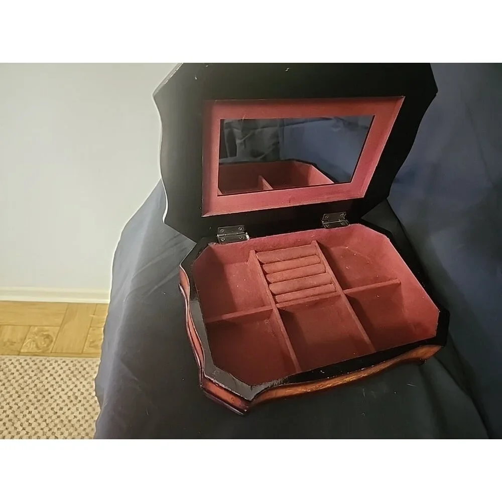 wooden jewelry box with violin pictured‎ on top